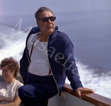 Brezhnev resting on a motorboat