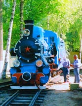 The "Kukushka" — a Kp-series steam locomotive — pulls out of the depot onto the children's railway line. Its technical specifications: power output — 370 kW; steam temperature in t