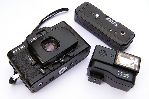 Petri PX-1 with an additional external flash and motor drive