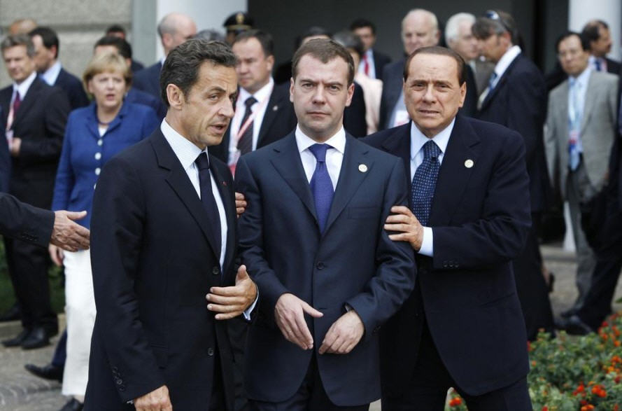 Dmitry Medvedev surrounded by colleagues