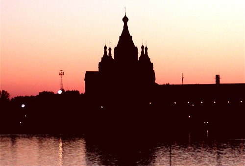 View of the Strelka river port after sunset
