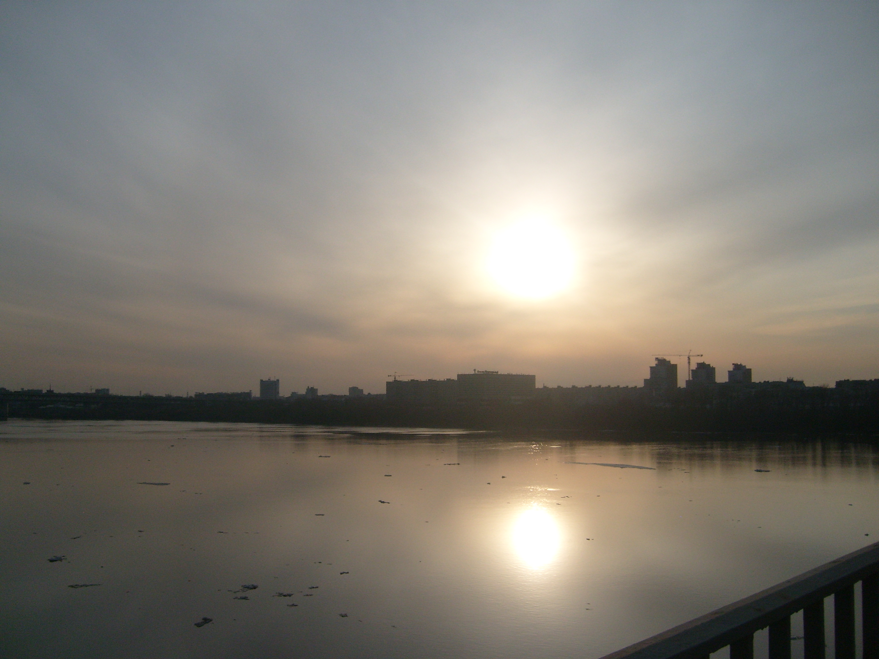 Sunset over the river. Photo by Vladimir Gomozov