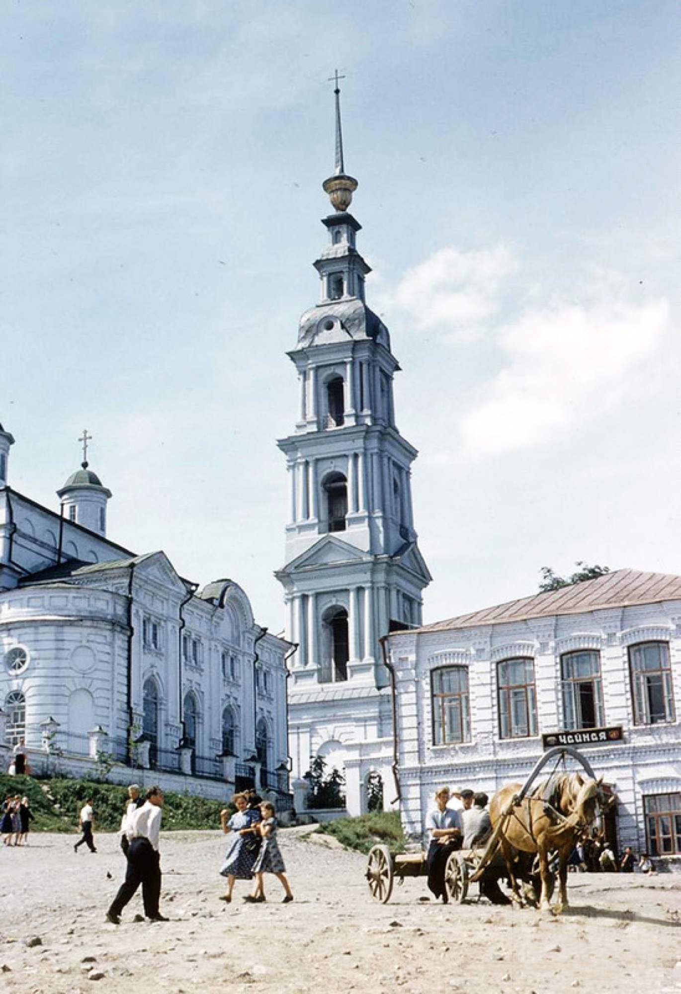White bell tower church square