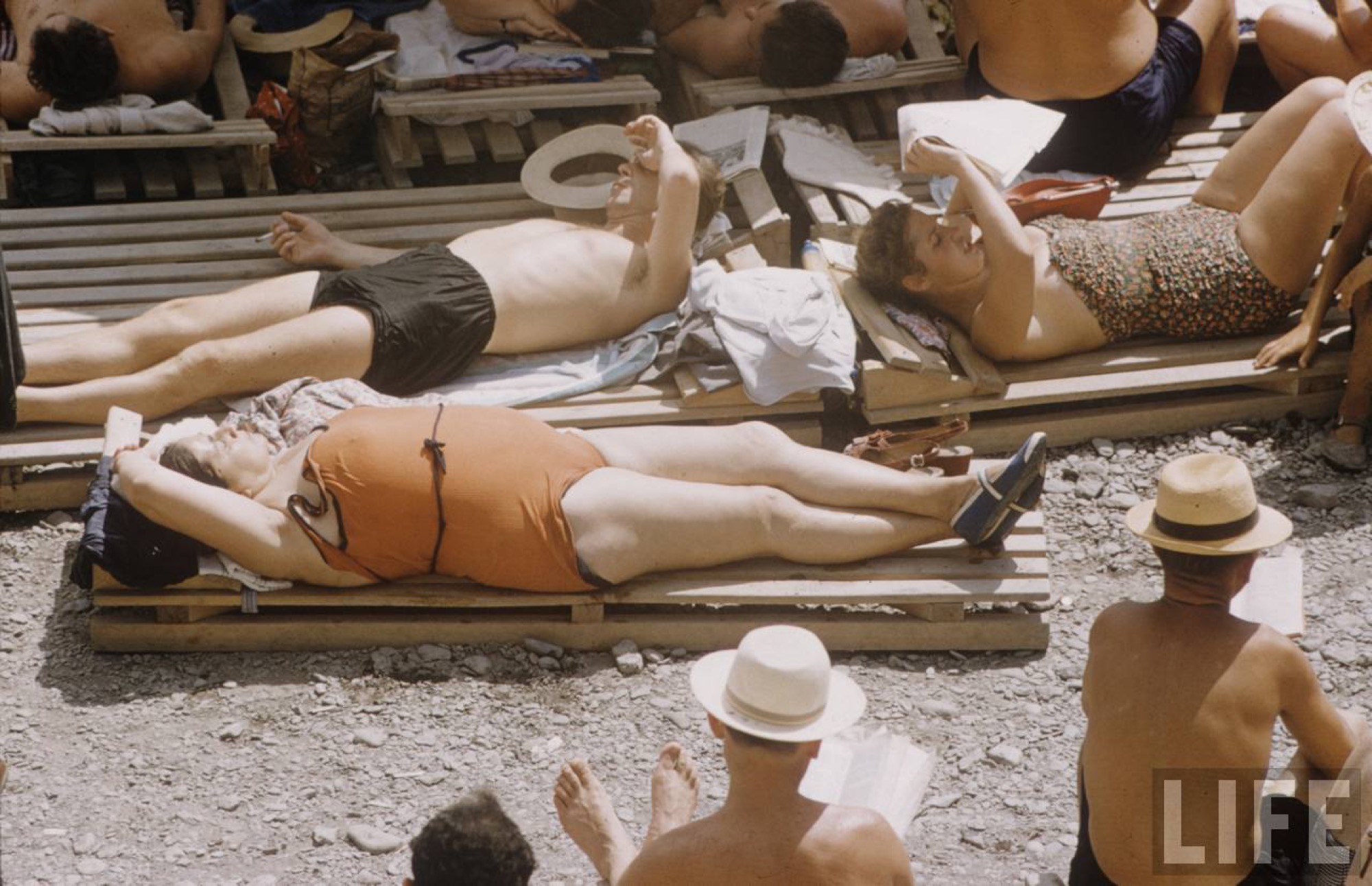 Beach, sunbathers, deck chairs, LIFE magazine