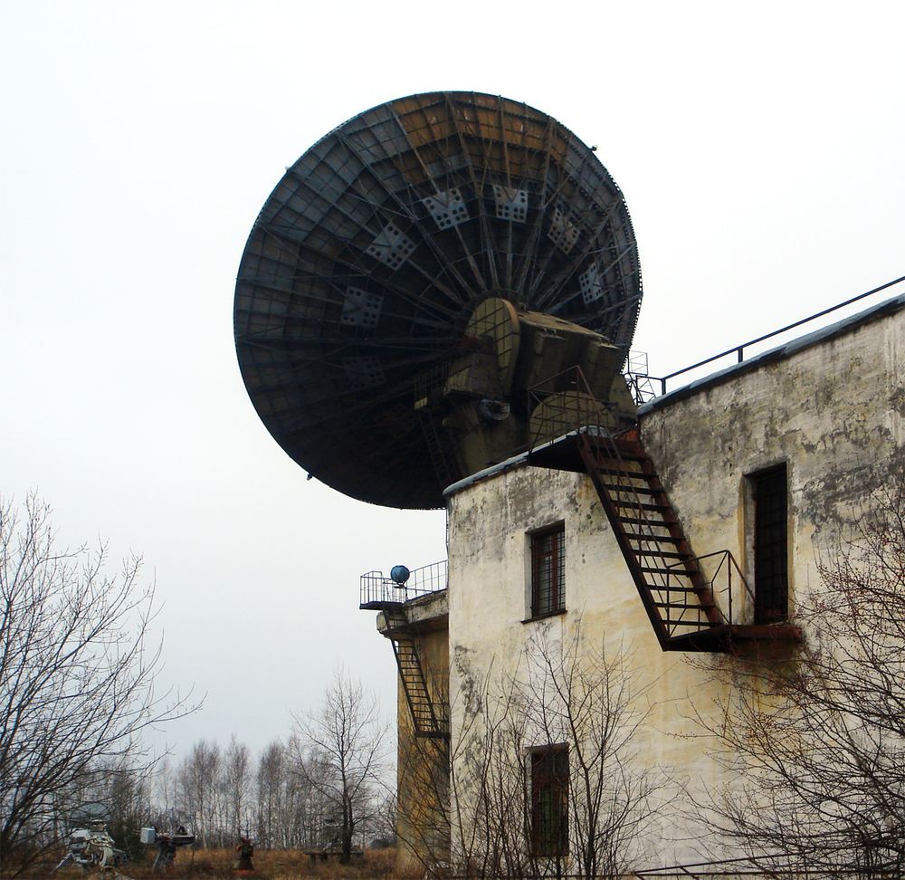 Parabolic antenna on the building's roof