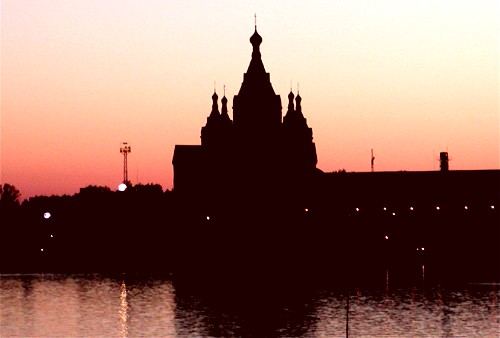 View of the Strelka river port after sunset
